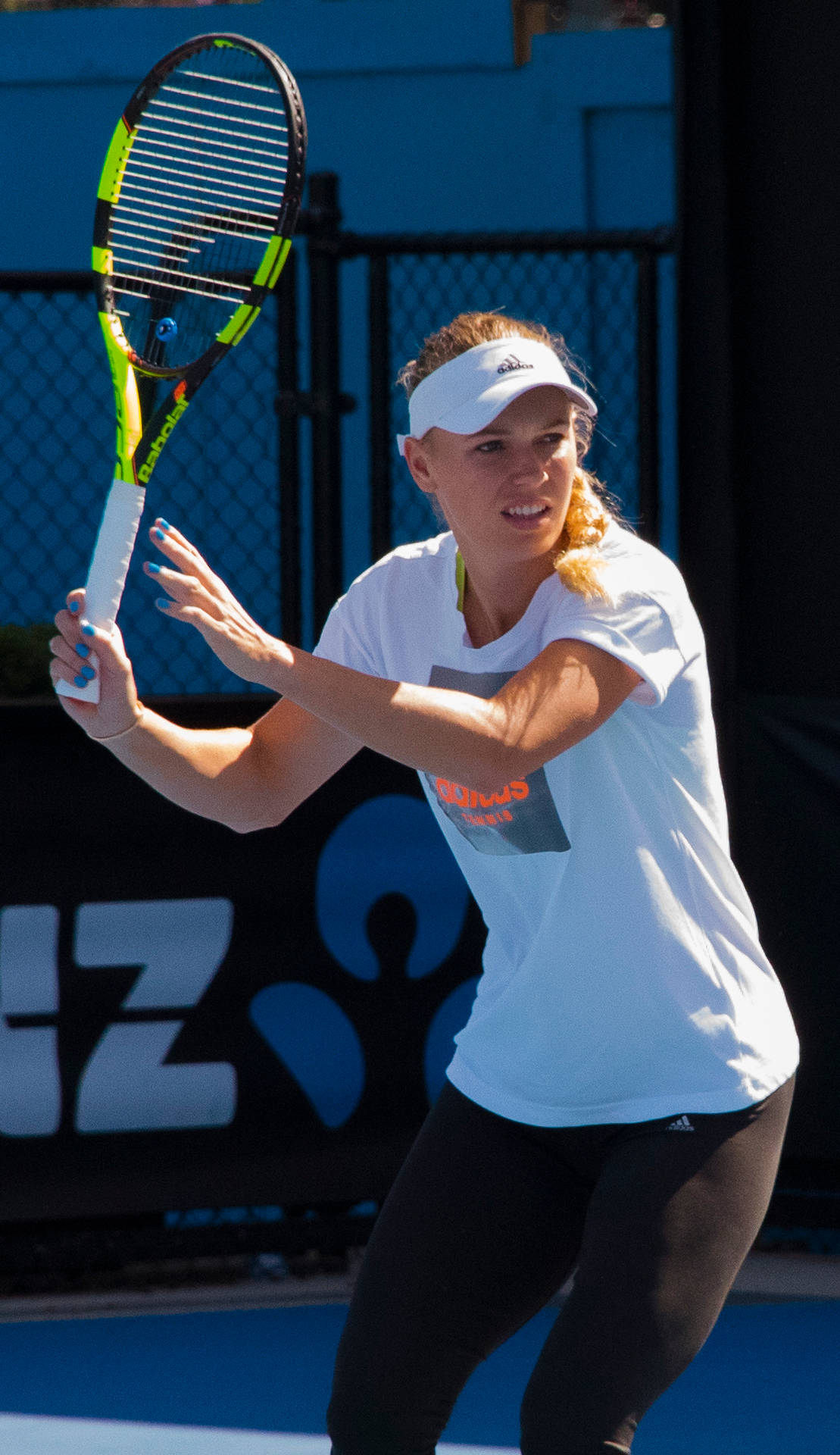 Caroline Wozniacki With Tennis Racket Background