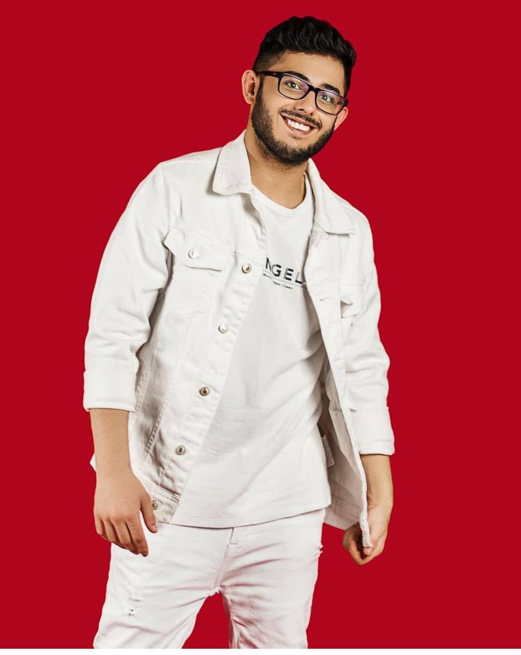 Carryminati In Red Background Background