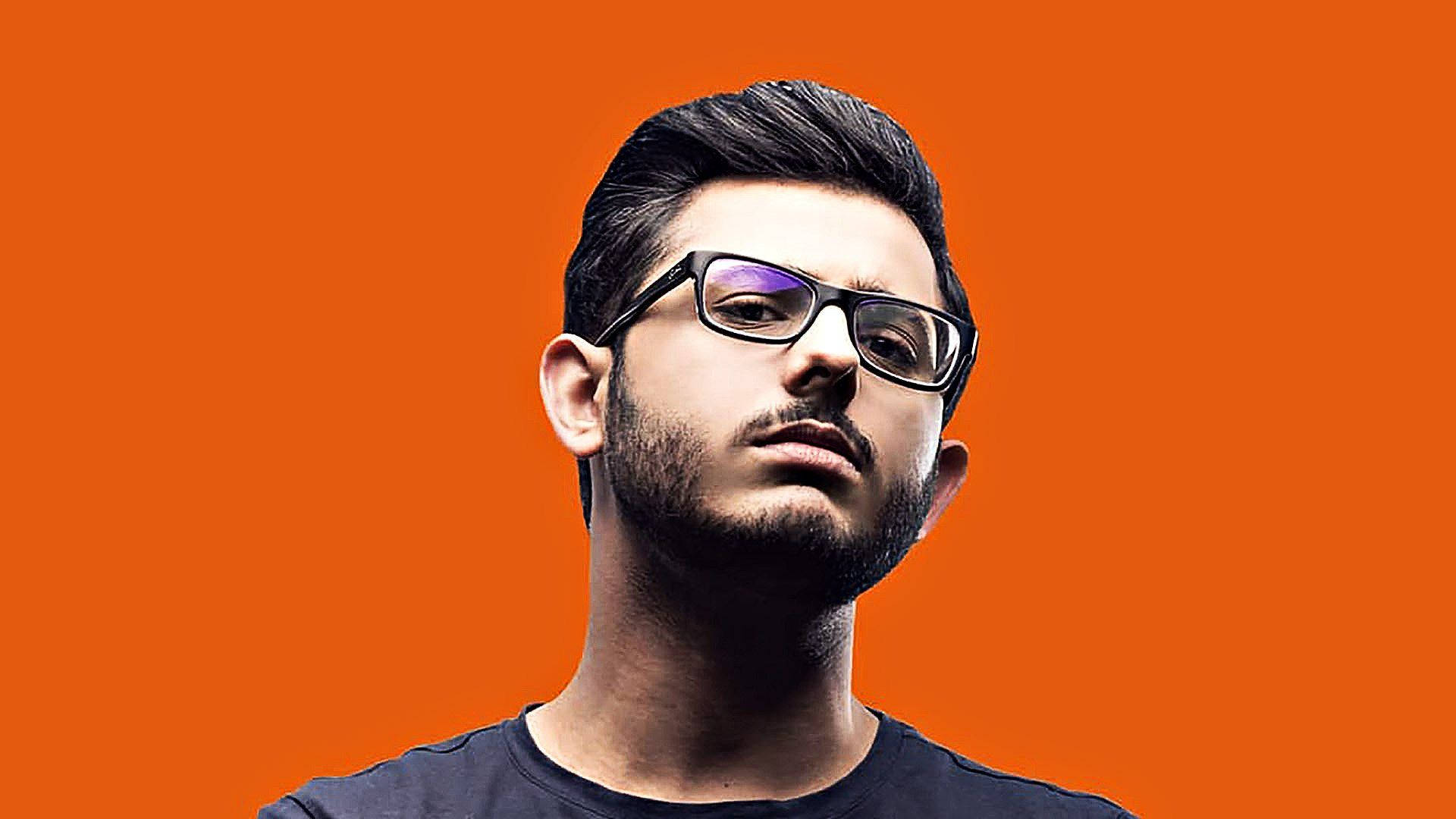 Carryminati Portrait With An Orange Background Background