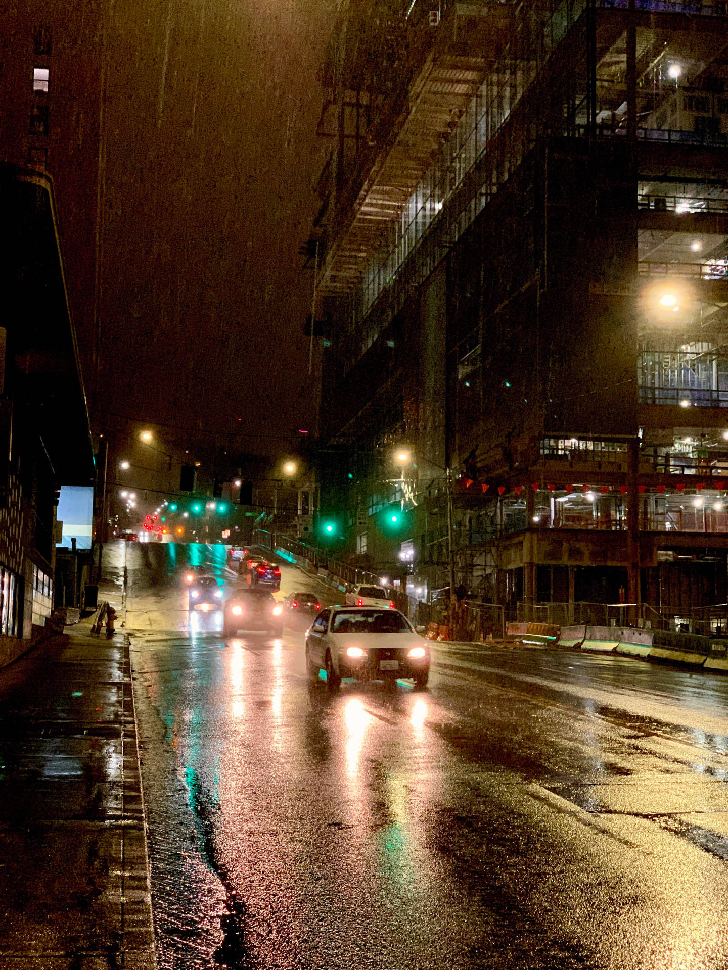 Cars On Streets Under Seattle Rain Background