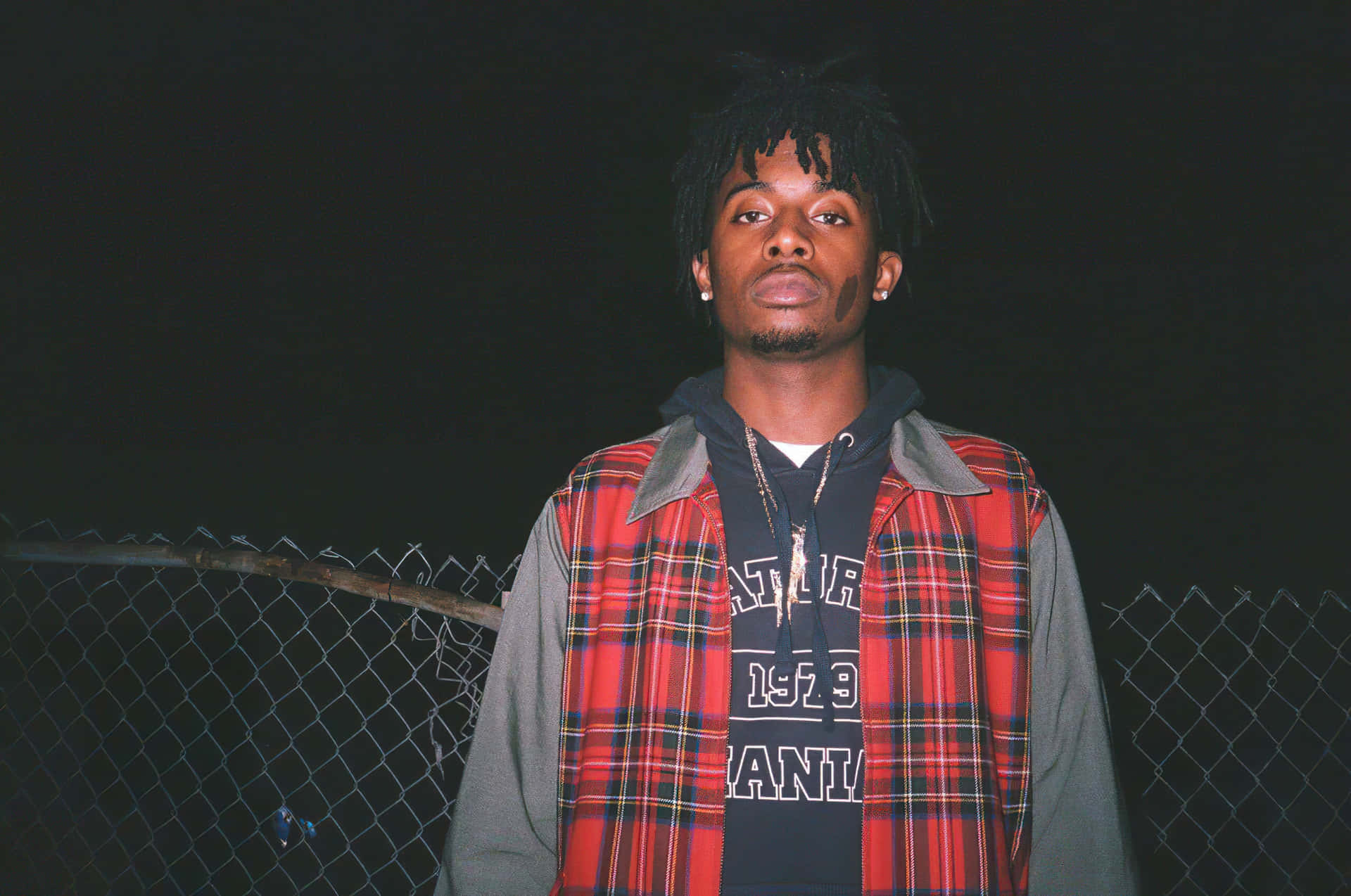 Carti Pfp With Plaid Jacket Background