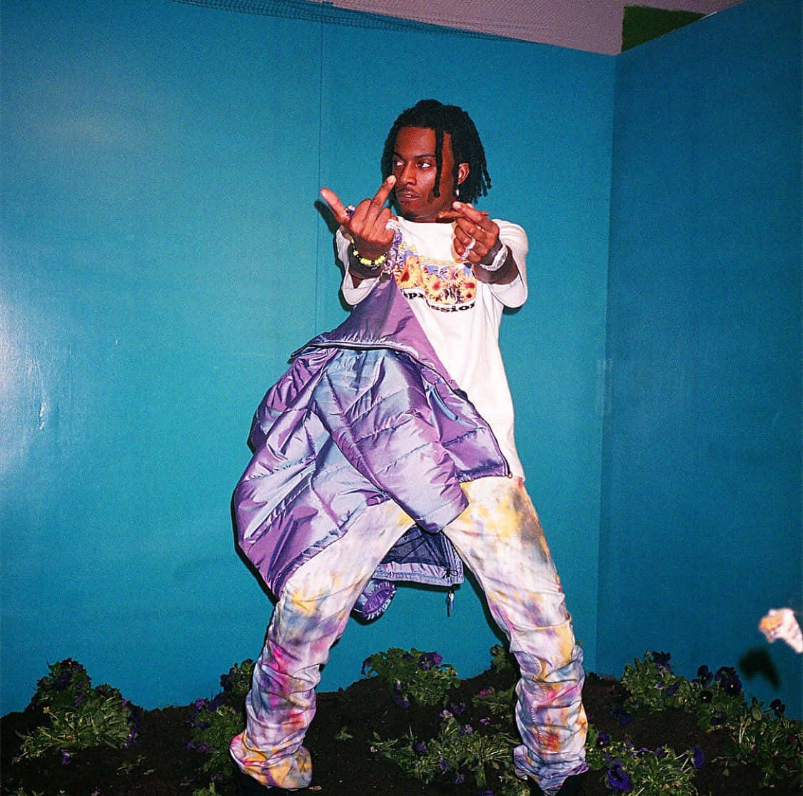 Carti Pfp With Puffy Purple Jacket Background