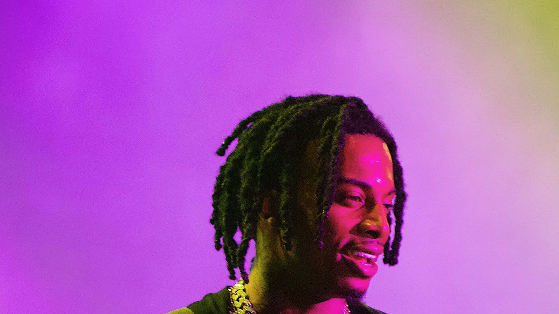 Carti Pfp With Purple Stage Light Background