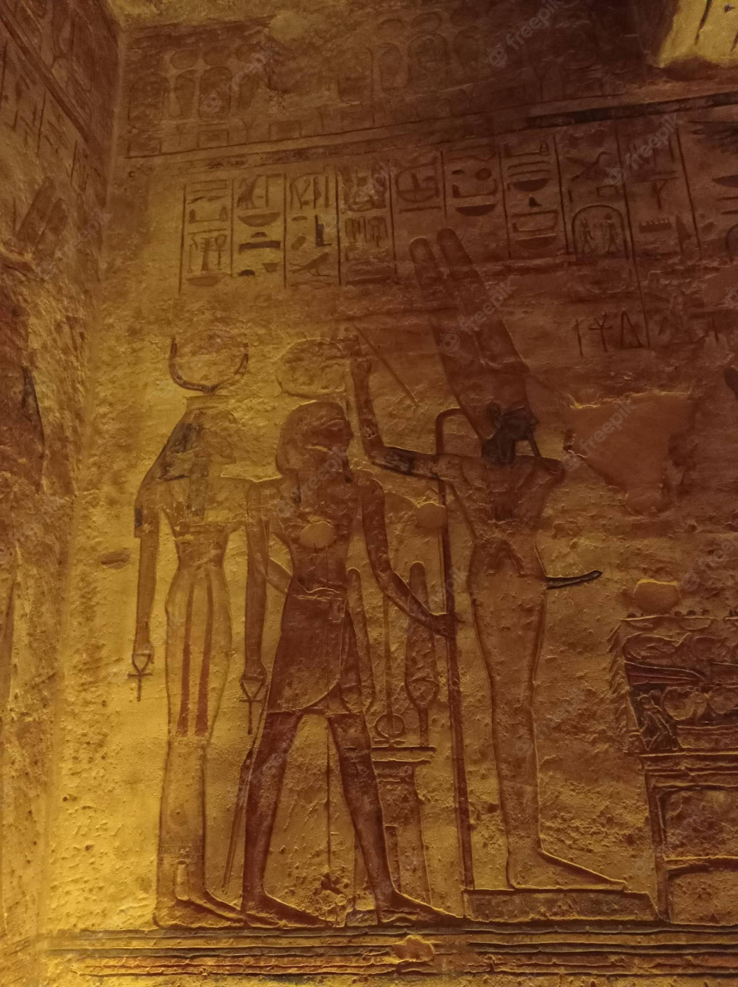 Carved Figures Inside The Temple Of Abu Simbel Background