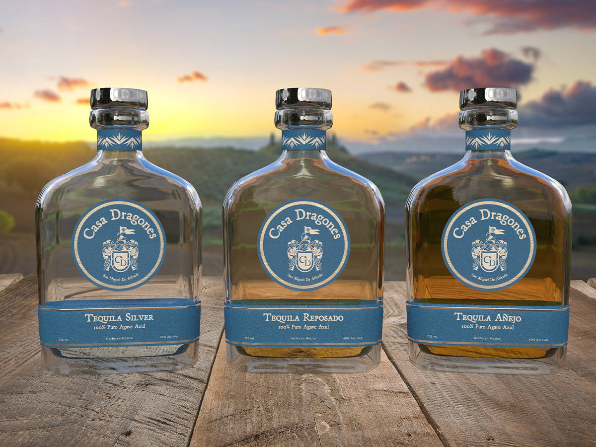 Casa Dragones Tequila Azul Agave Bottles Background