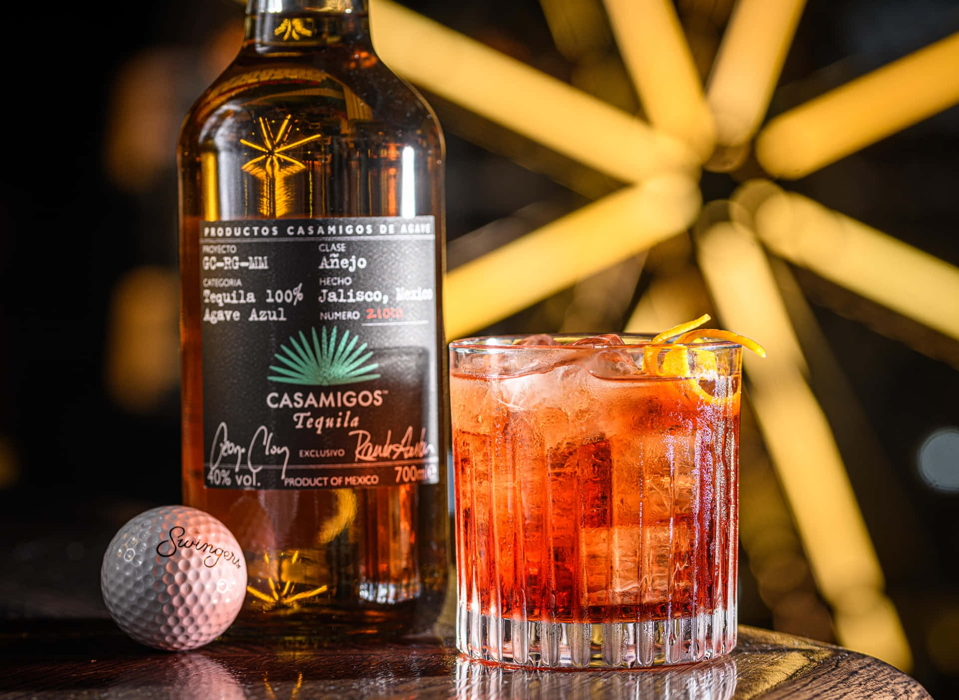 Casamigos Añejo Tequila Paired With Negroni Cocktail Background