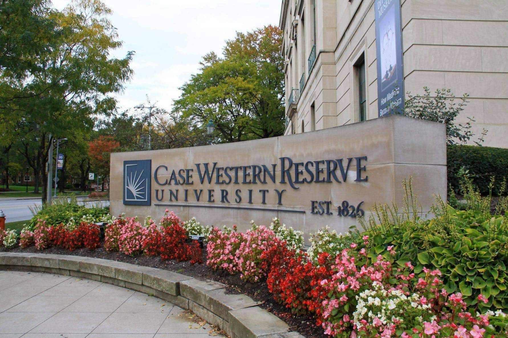 Case Western Reserve University Sign Flowers Background