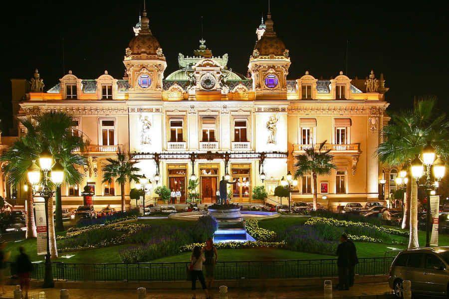Casino De Monte Carlo At Night Background