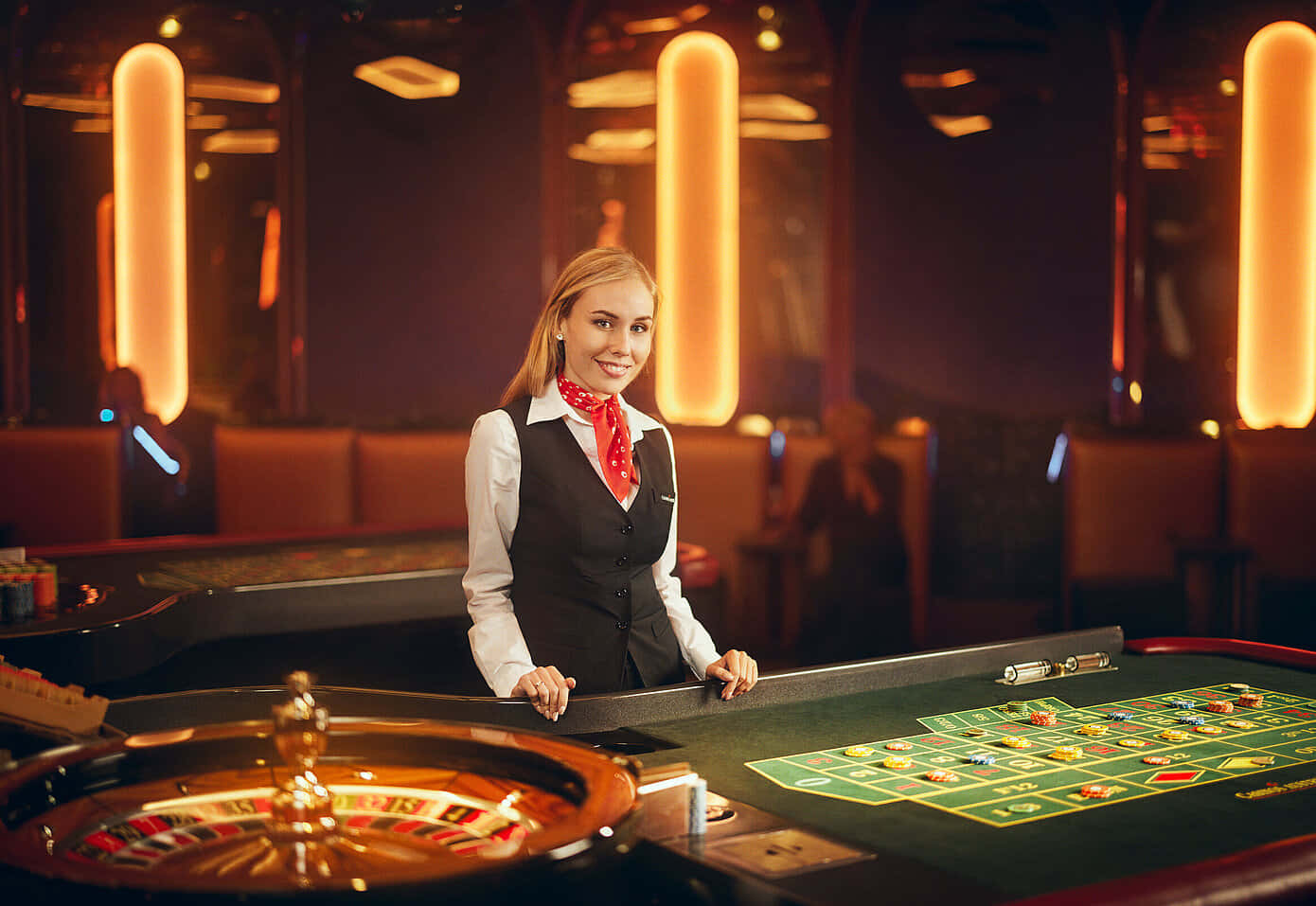 Casino Dealer At A Roulette Table Background