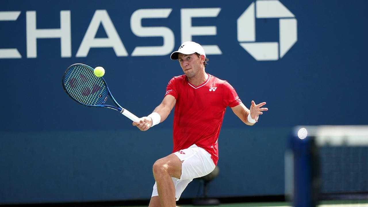 Casper Ruud Wearing Red Shirt Background