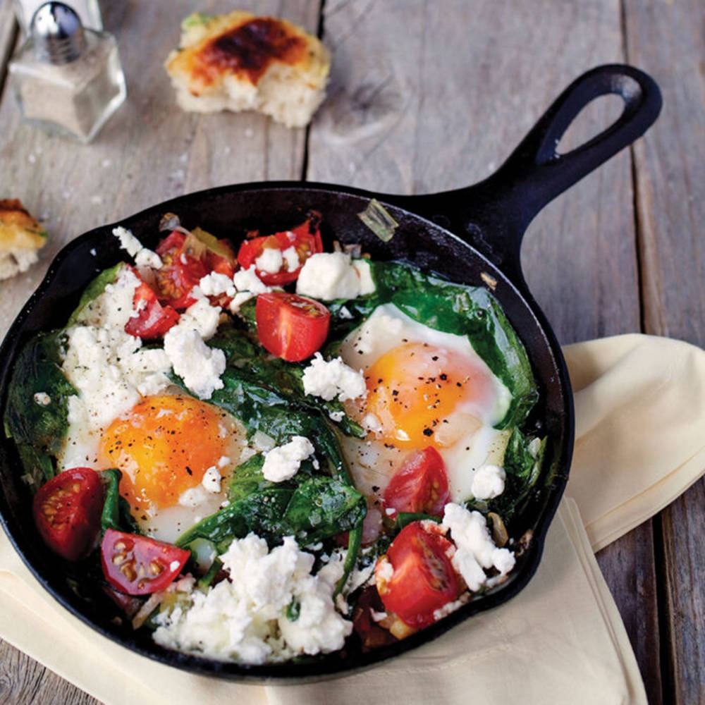 Cast Iron Skillet With Eggs Background