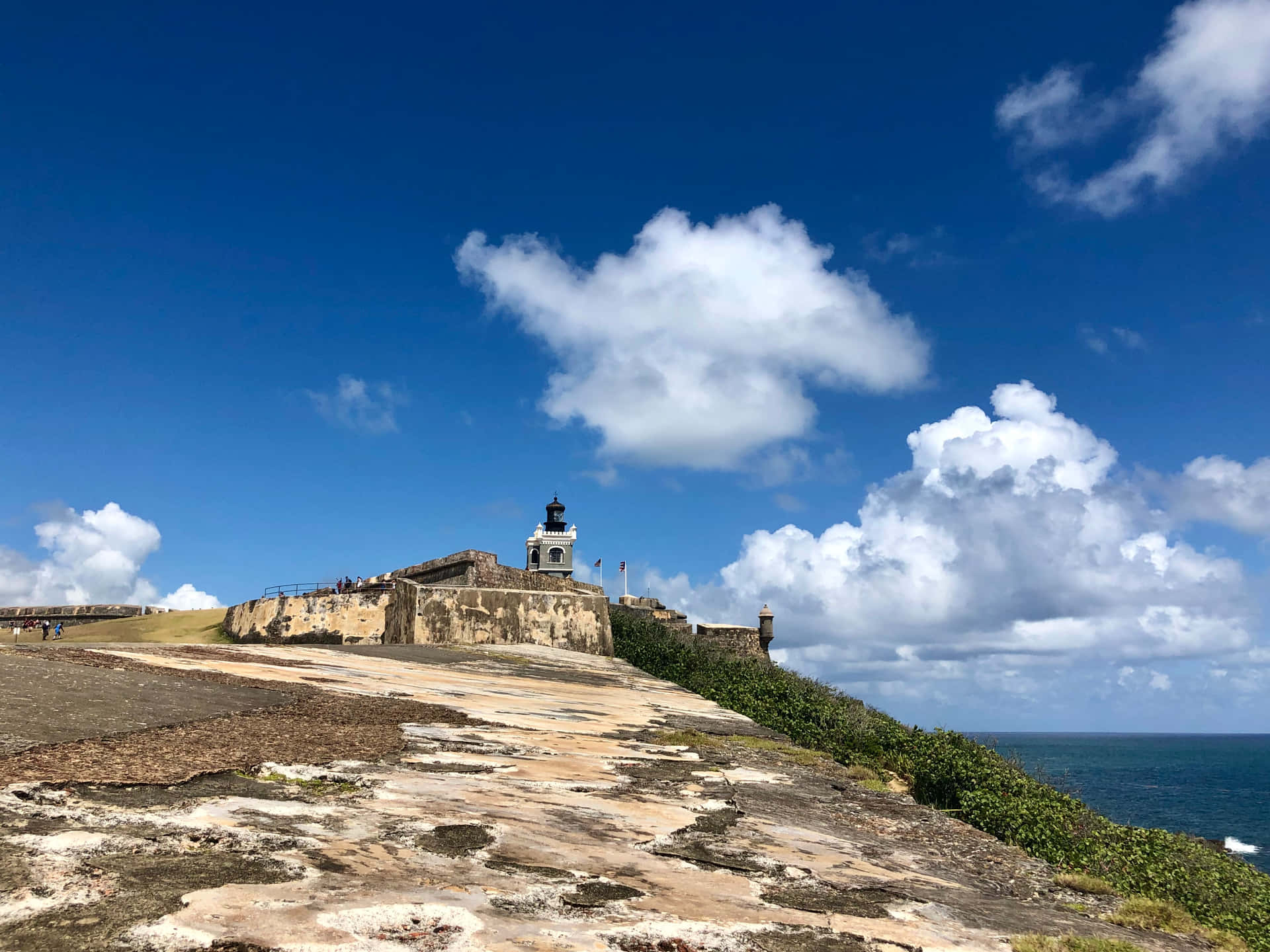 Castillo San Felipe Del Morro Lighthouse From Afar Background