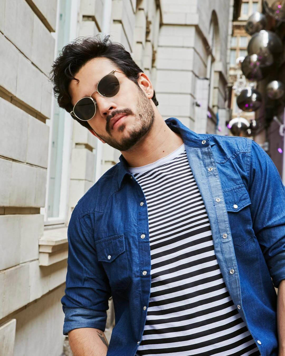 Casual Akhil Akkineni With Shades Background