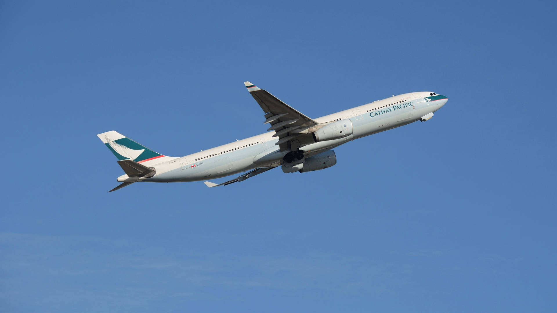 Cathay Pacific Plain Blue Sky Background