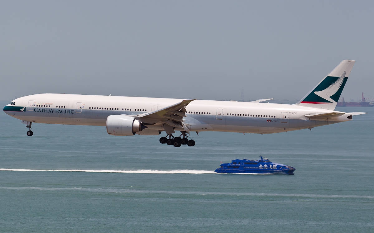 Cathay Pacific Plane And Blue Ship Background