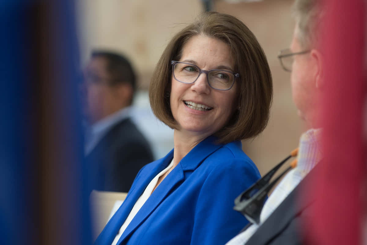 Catherine Cortez Masto Presenting A Speech Background