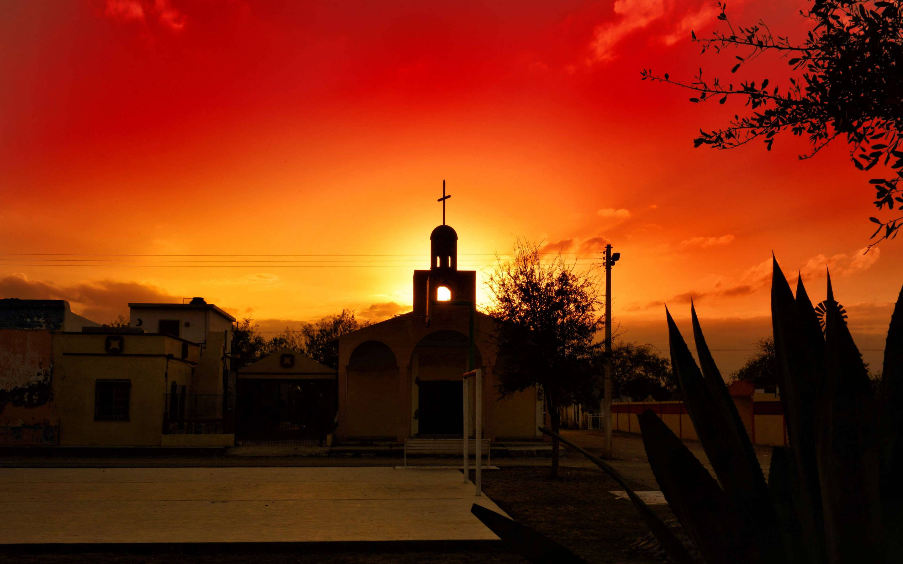 Catholic Church And Sunset Background