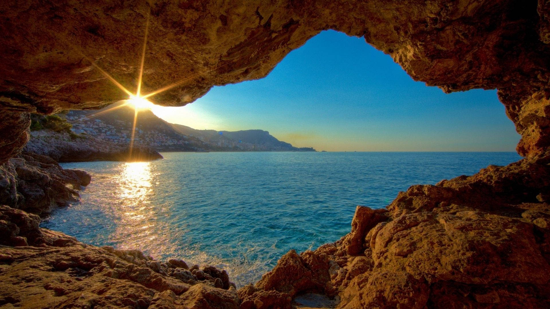 Cave Facing The Sea Background