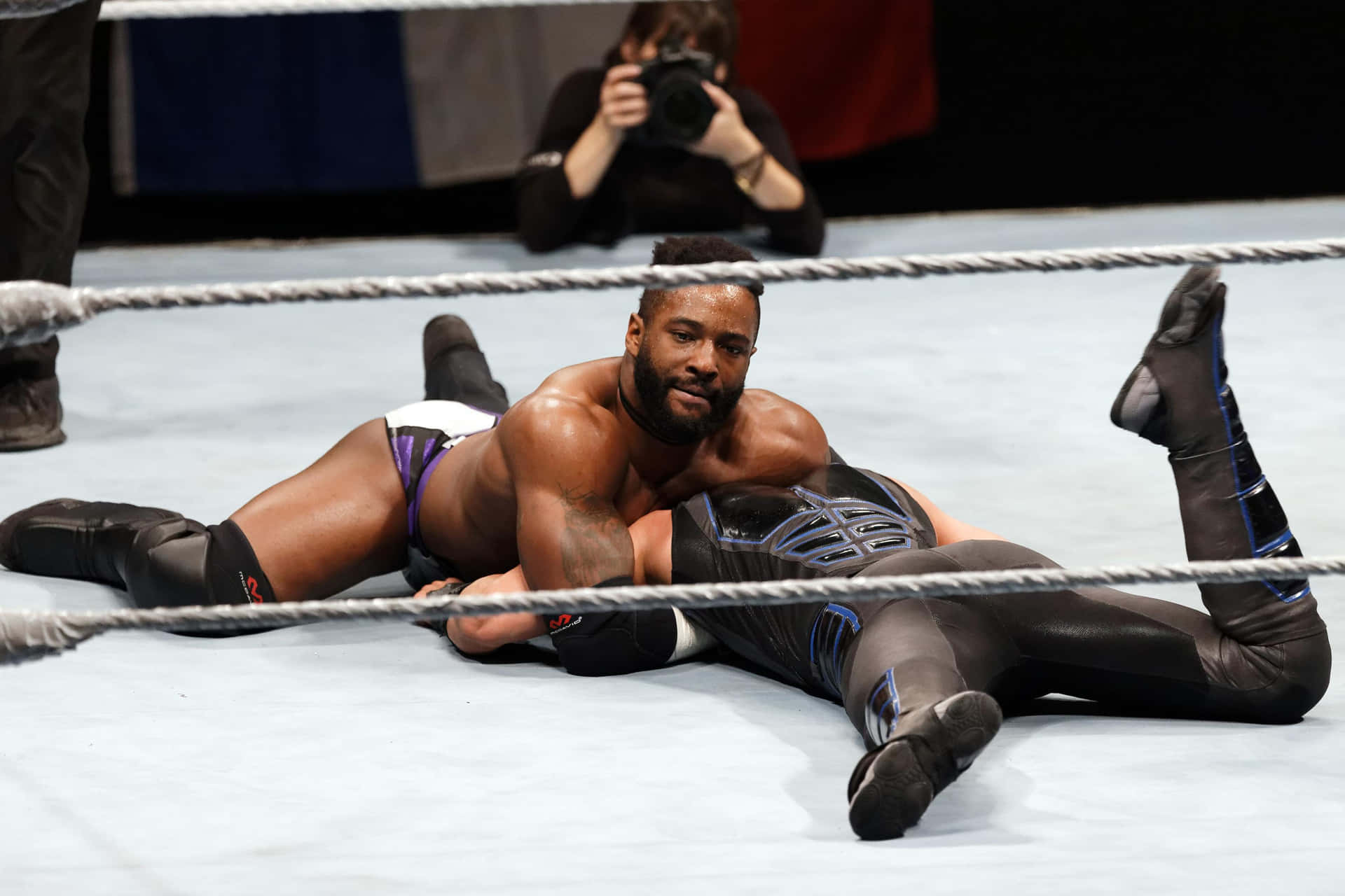 Cedric Alexander In A Electrifying Wwe Match Against Mustafa Ali. Background