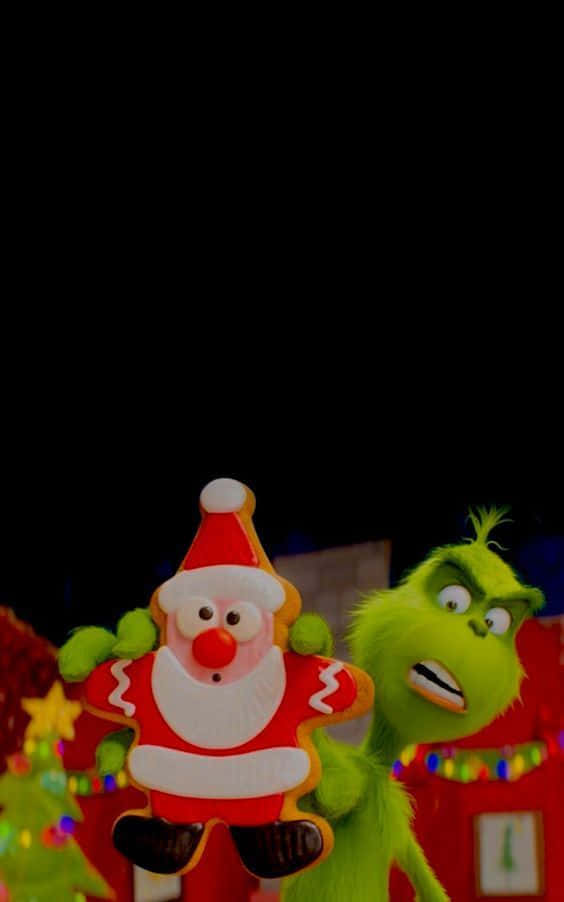 Celebrate Christmas In Style With The Grinch Christmas Iphone Background