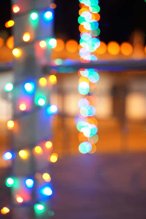 Celebrate Christmas Night Amidst The Tranquil Beauty Of A Winter Landscape Background