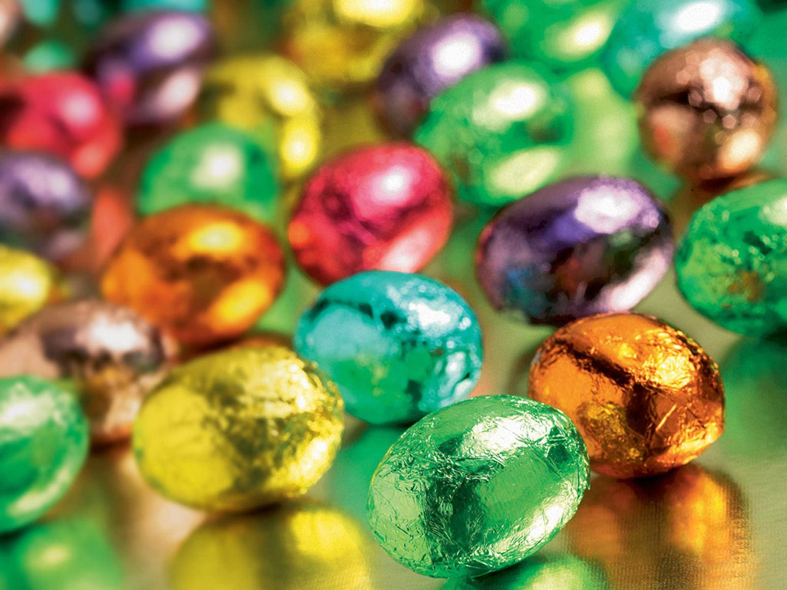 Celebrate Easter With Colorful Chocolate Eggs! Background