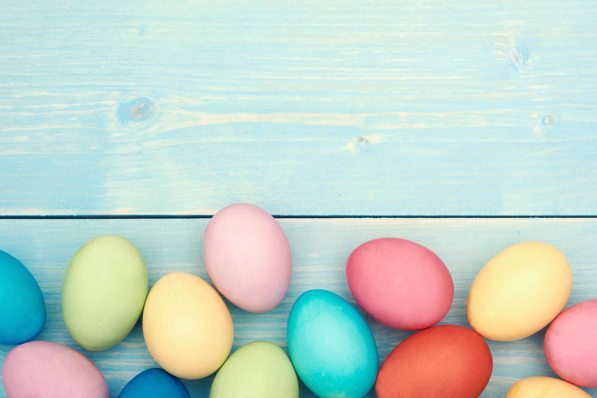 Celebrate Easter With Painted Eggs And Pastel Spring Colors Background