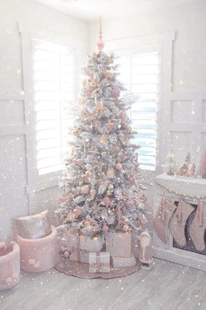 Celebrate The Holidays With A Beautiful Pink Christmas Tree Background