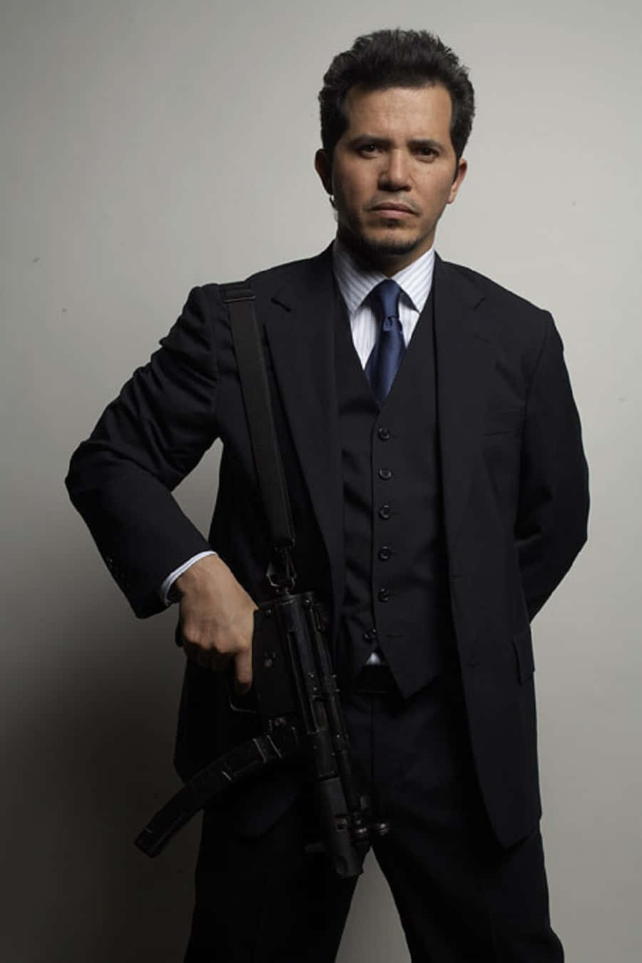 Celebrated Actor John Leguizamo In A Candid Portrait Background
