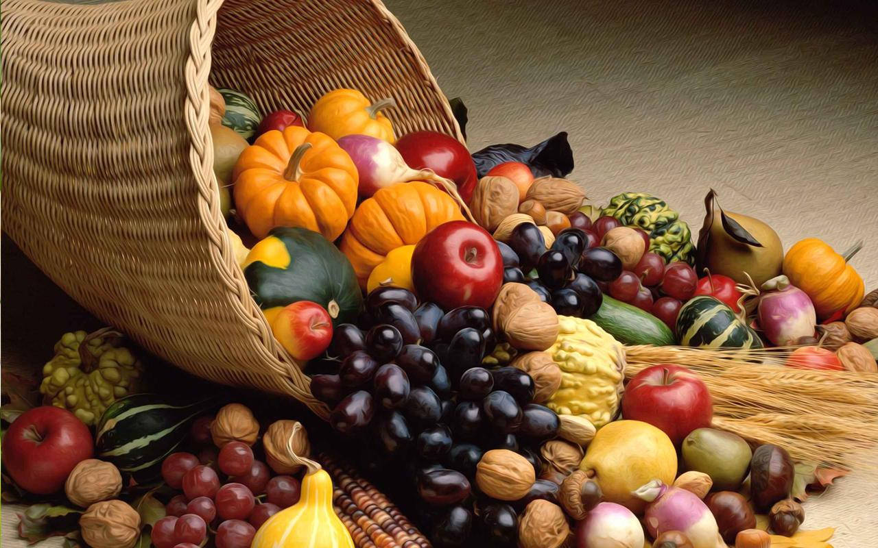 Celebrating A Thanksgiving Harvest Of Fruits Background