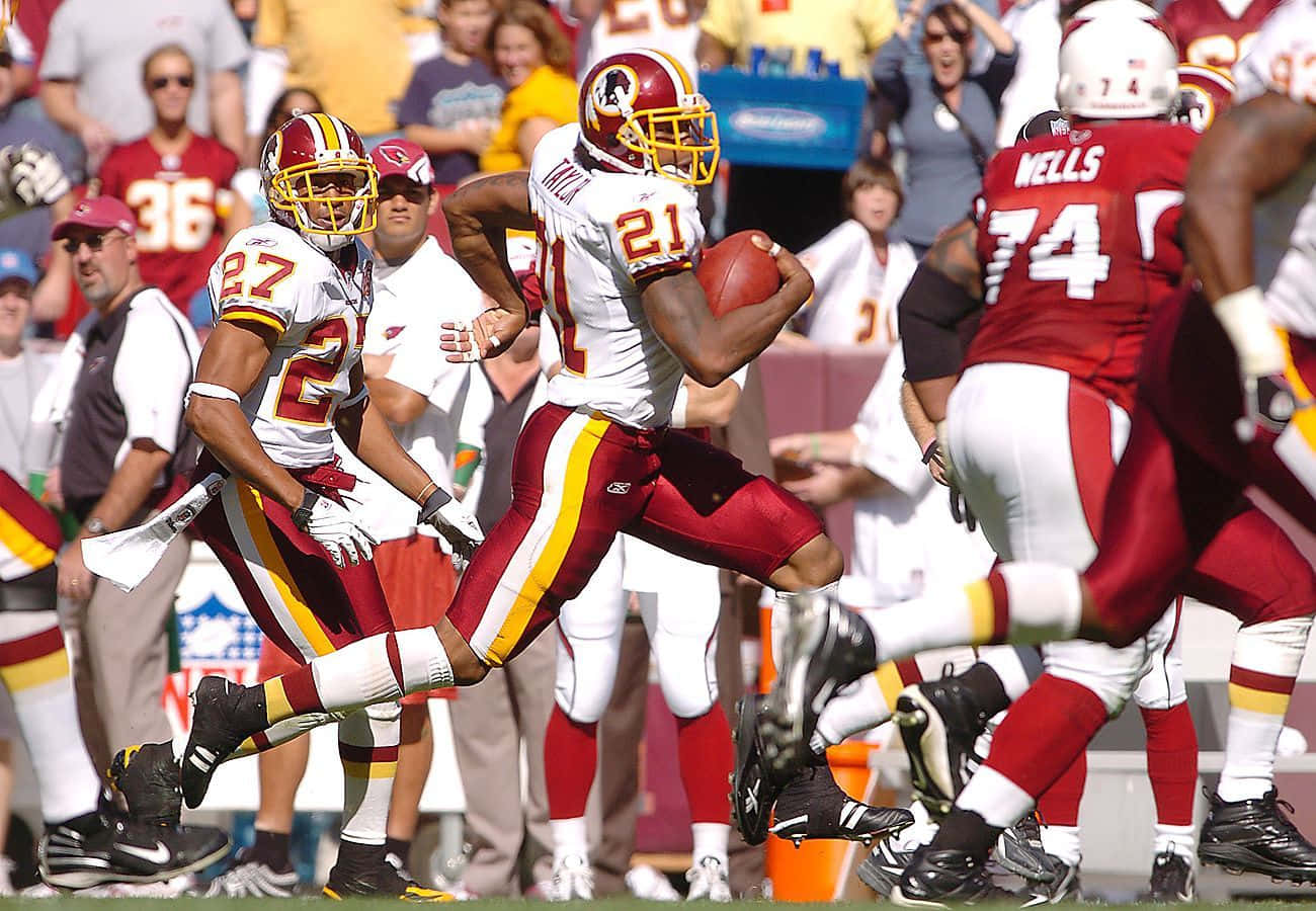 Celebrating An Interception By Washington Redskins Safety Sean Taylor Background