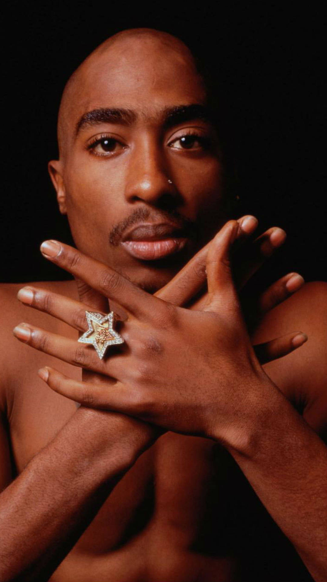 Celebrating The Life And Legacy Of Legendary Artist Tupac Shakur Background