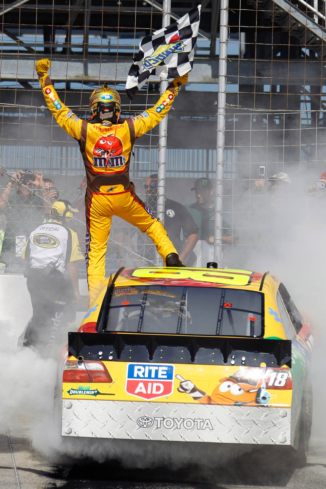 Celebration Victory - Kyle Busch At The Finish Line Background