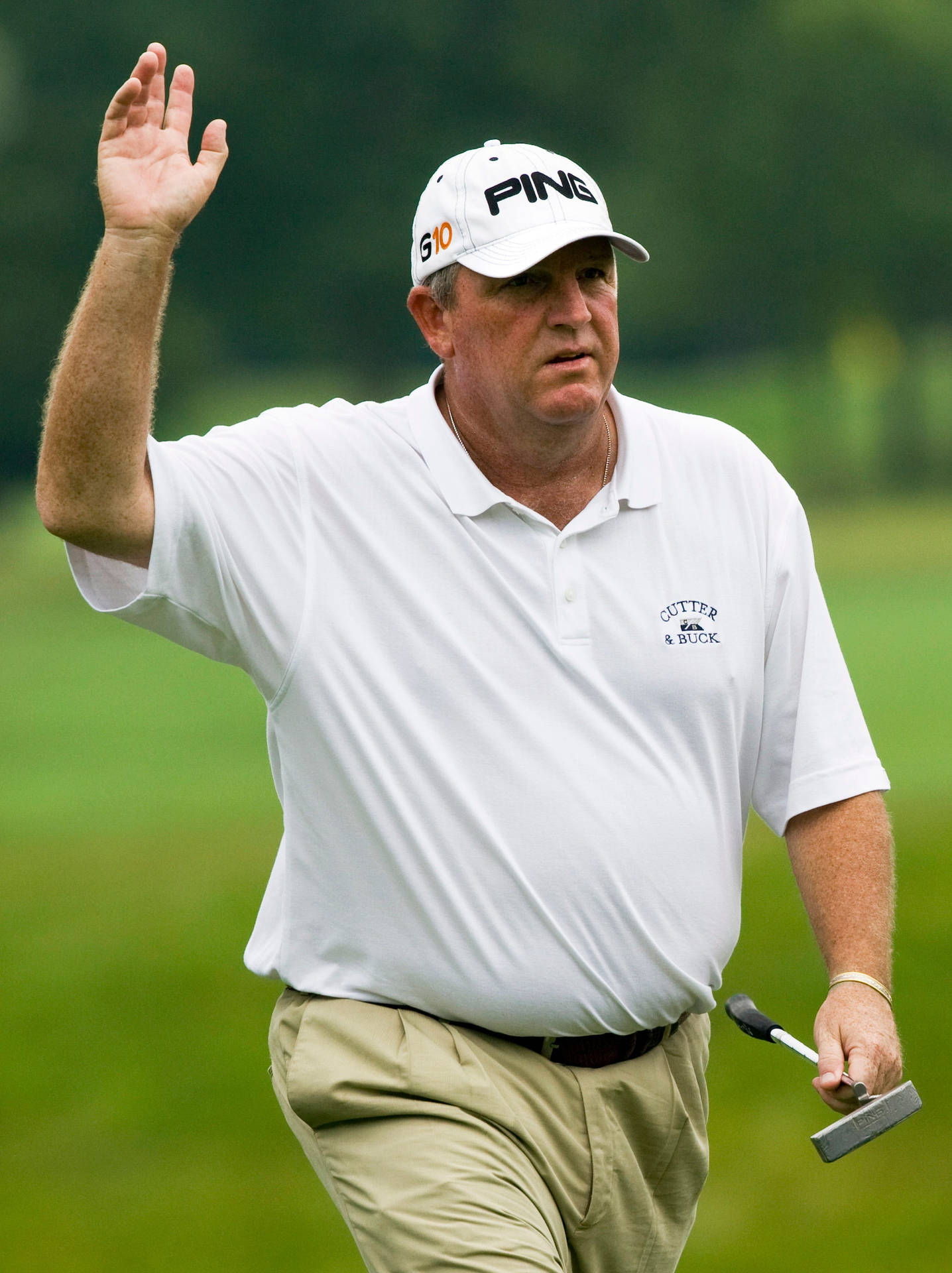 Celebratory Moment Of Mark Calcavecchia In Golf Tournament Background