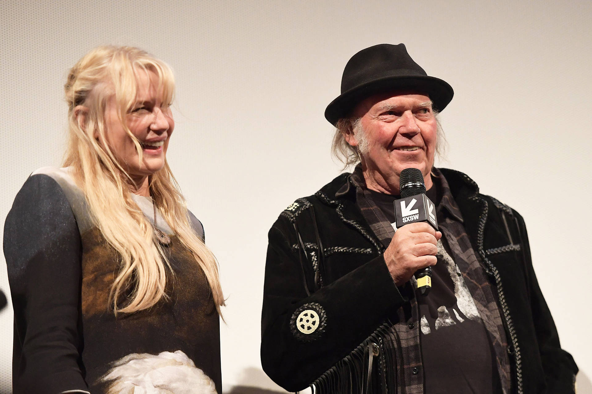 Celebrities Daryl Hannah And Neil Young Background