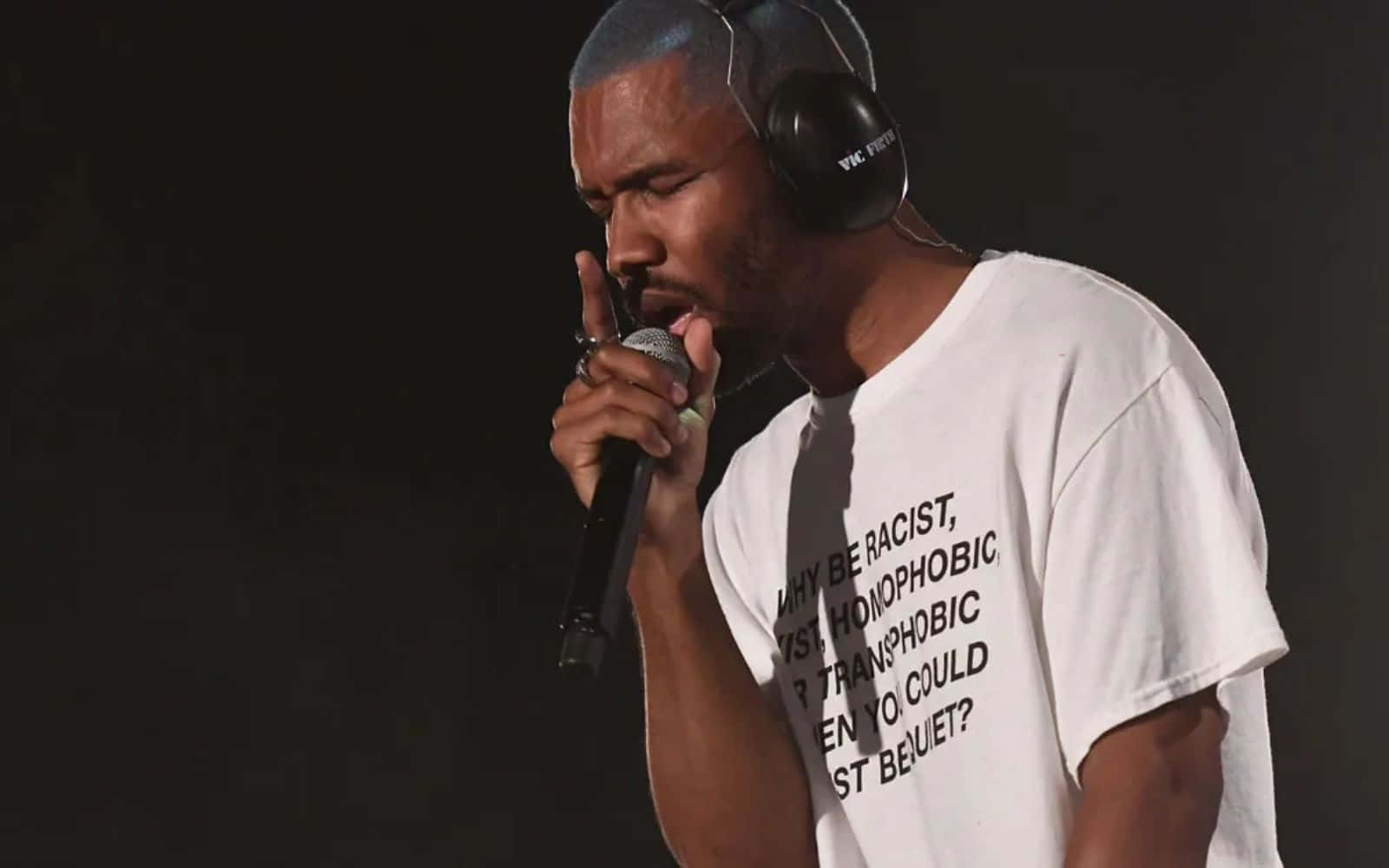 Celebrity Rapper Frank Ocean Working On His Laptop Background