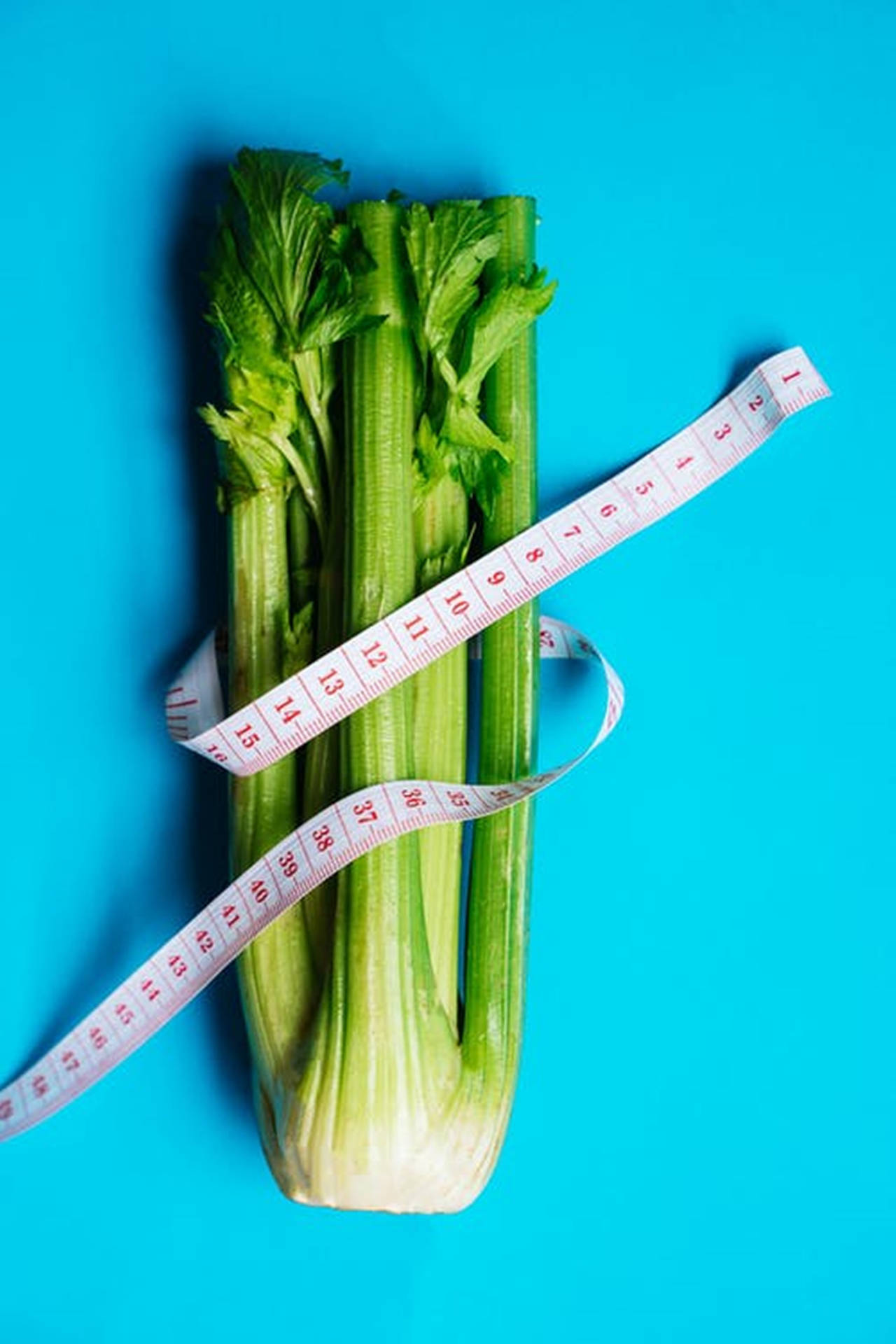 Celery With Measuring Tape Background