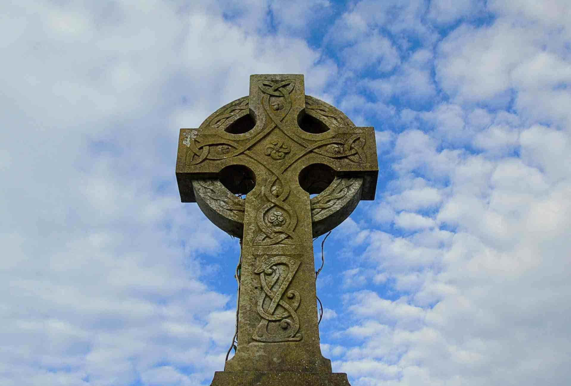 Celtic Irish Cross With Clouds Background