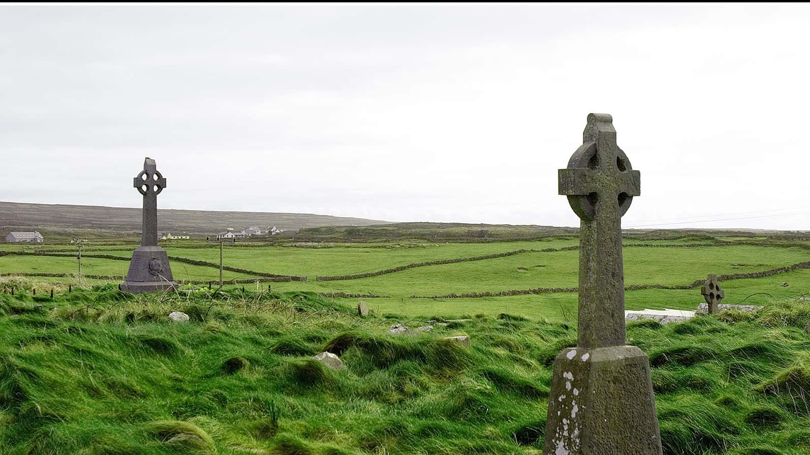 Celtic Irish Tombstones On Sunny Day Background