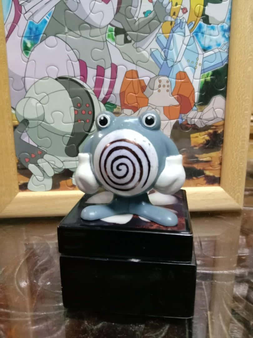 Ceramic Poliwhirl Statue Background