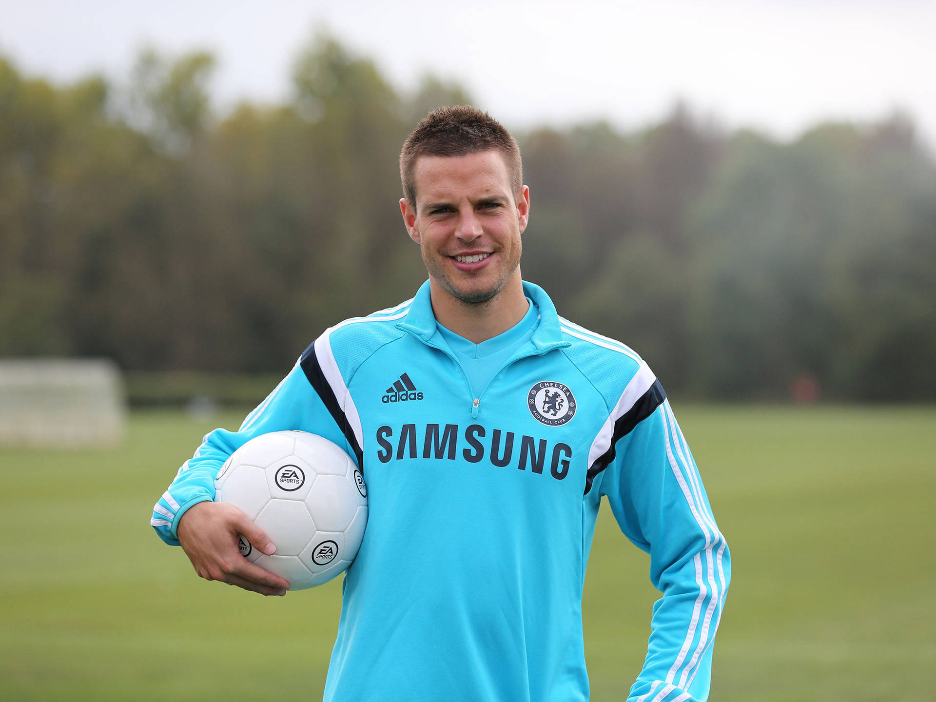 César Azpilicueta Carrying A Football