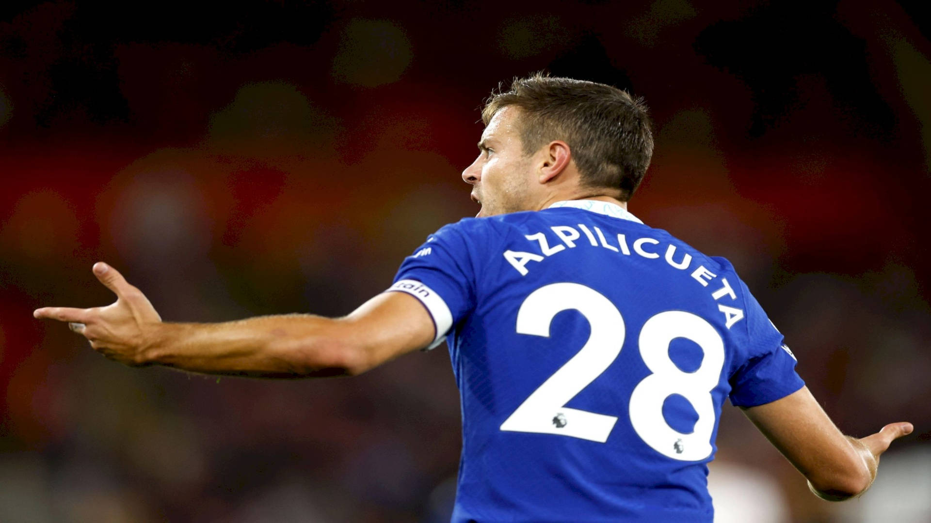 César Azpilicueta Caught In Action On The Football Field Background