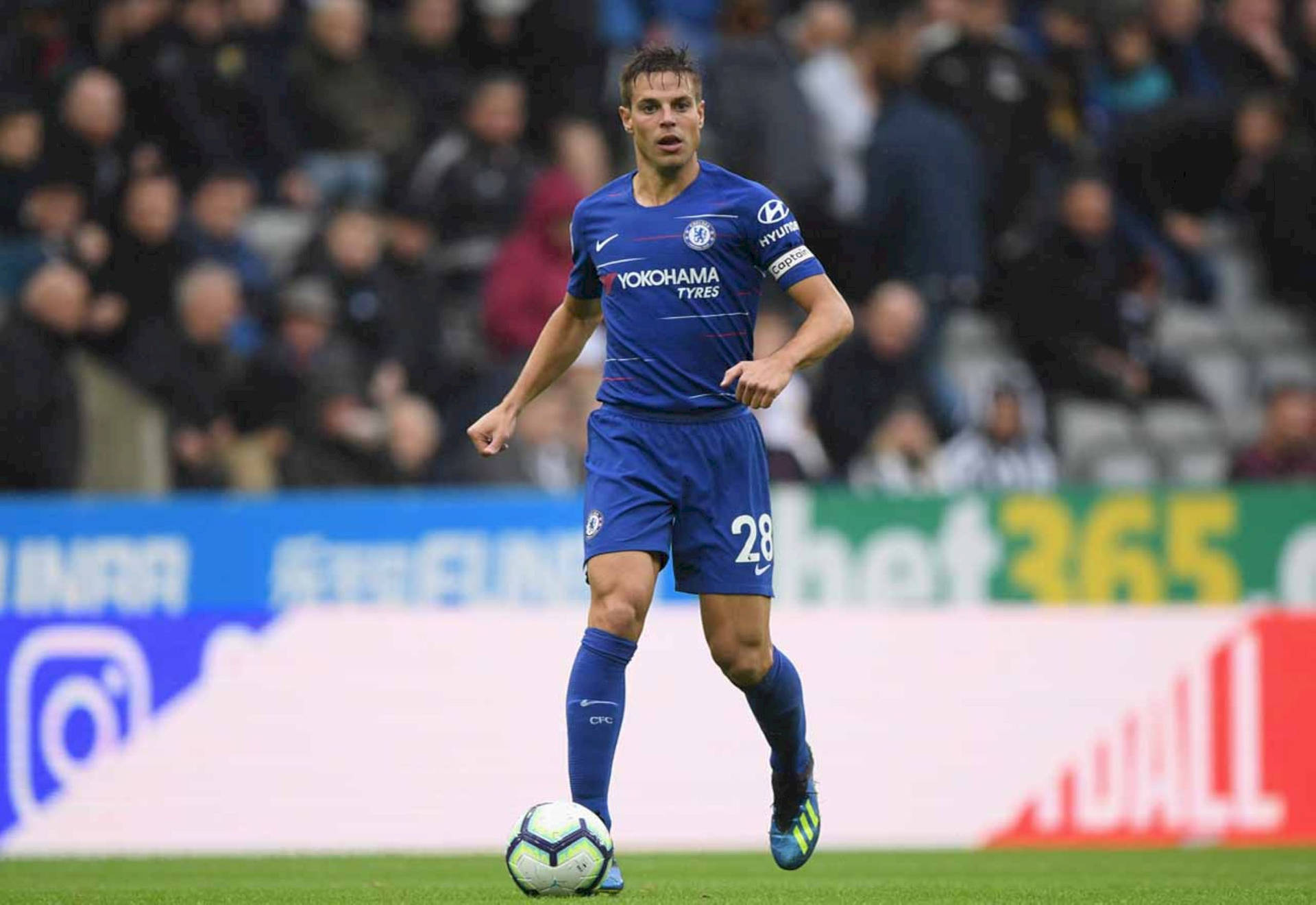 César Azpilicueta In Blue Uniform Background