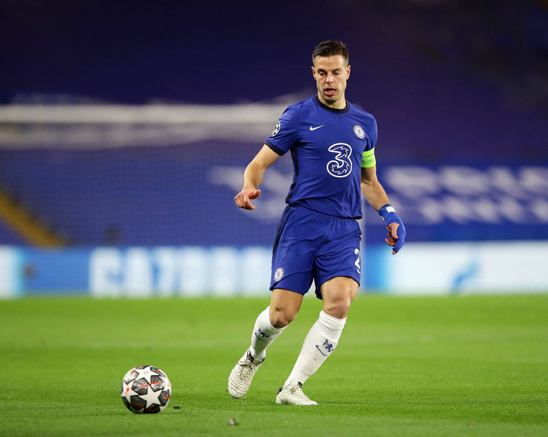 César Azpilicueta Running After Football Background