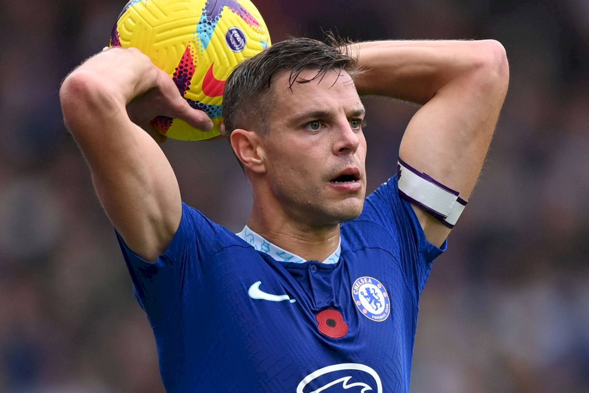 César Azpilicueta With Yellow Football Background