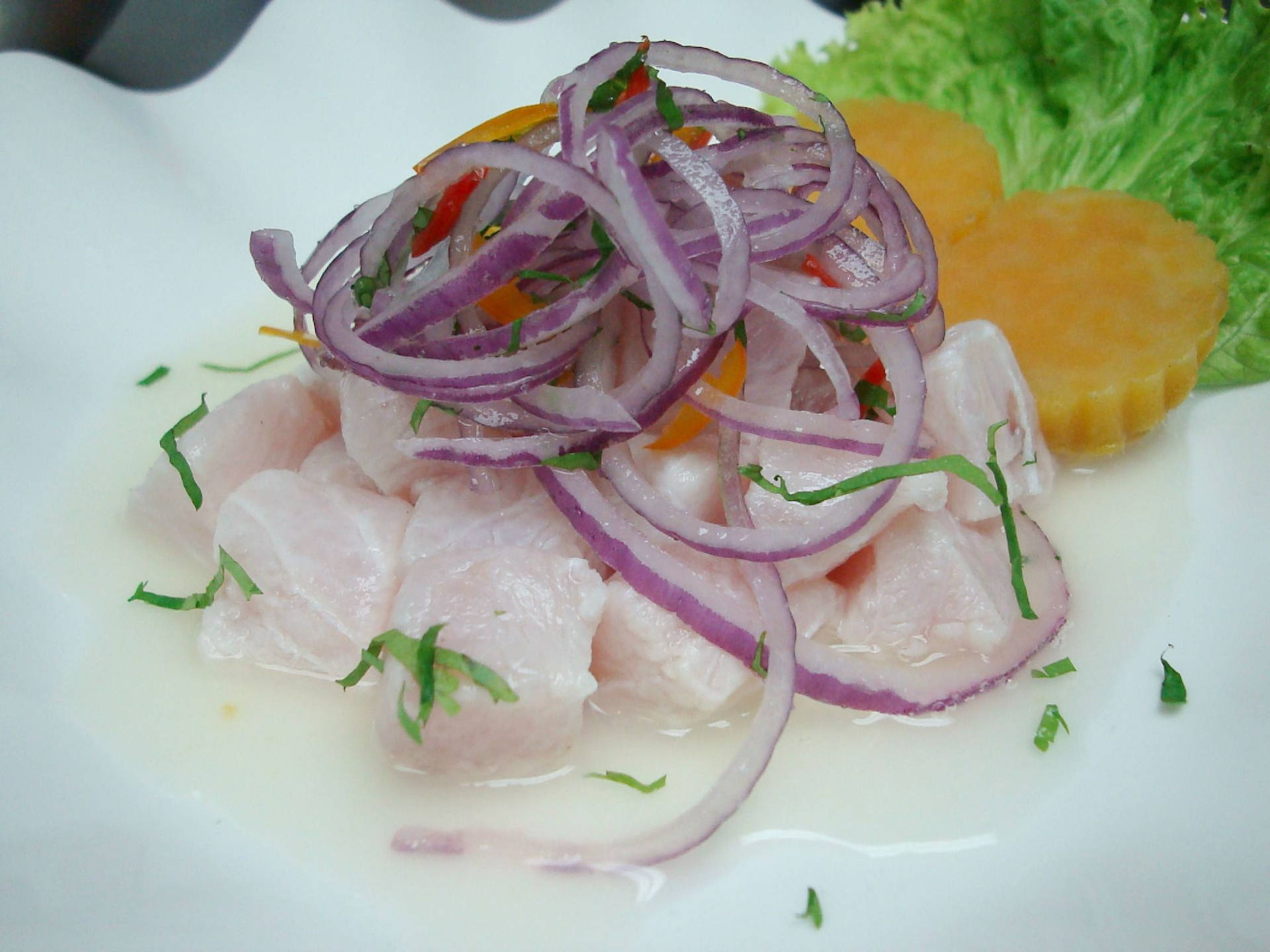 Ceviche Fish Topped With Onion Strips