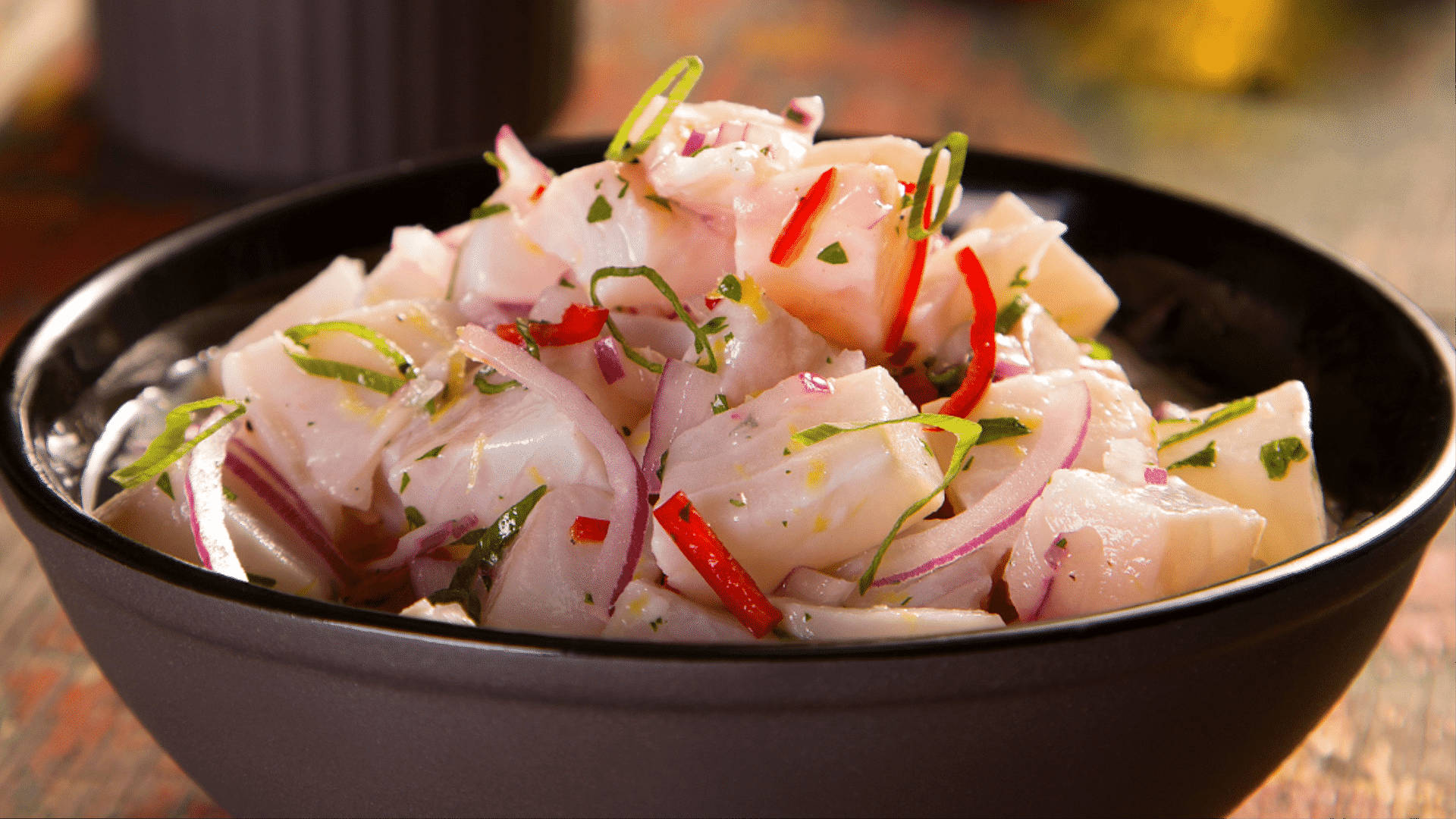 Ceviche With Onions In Black Bowl Background