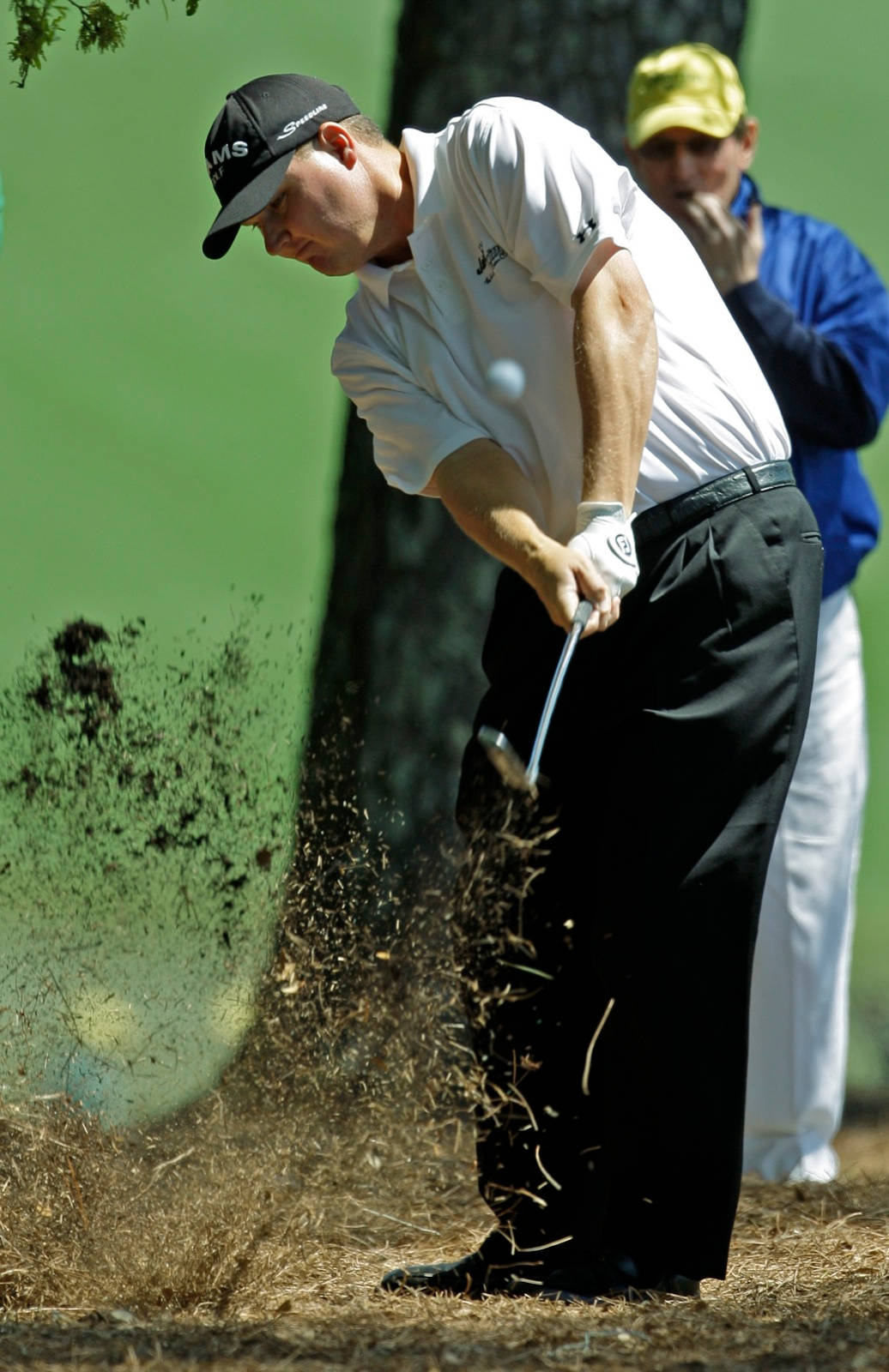 Chad Campbell Hitting Ball With Grass Background