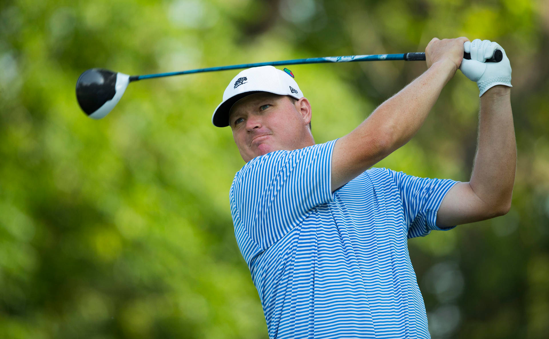 Chad Campbell Holding Golf Club Up Background