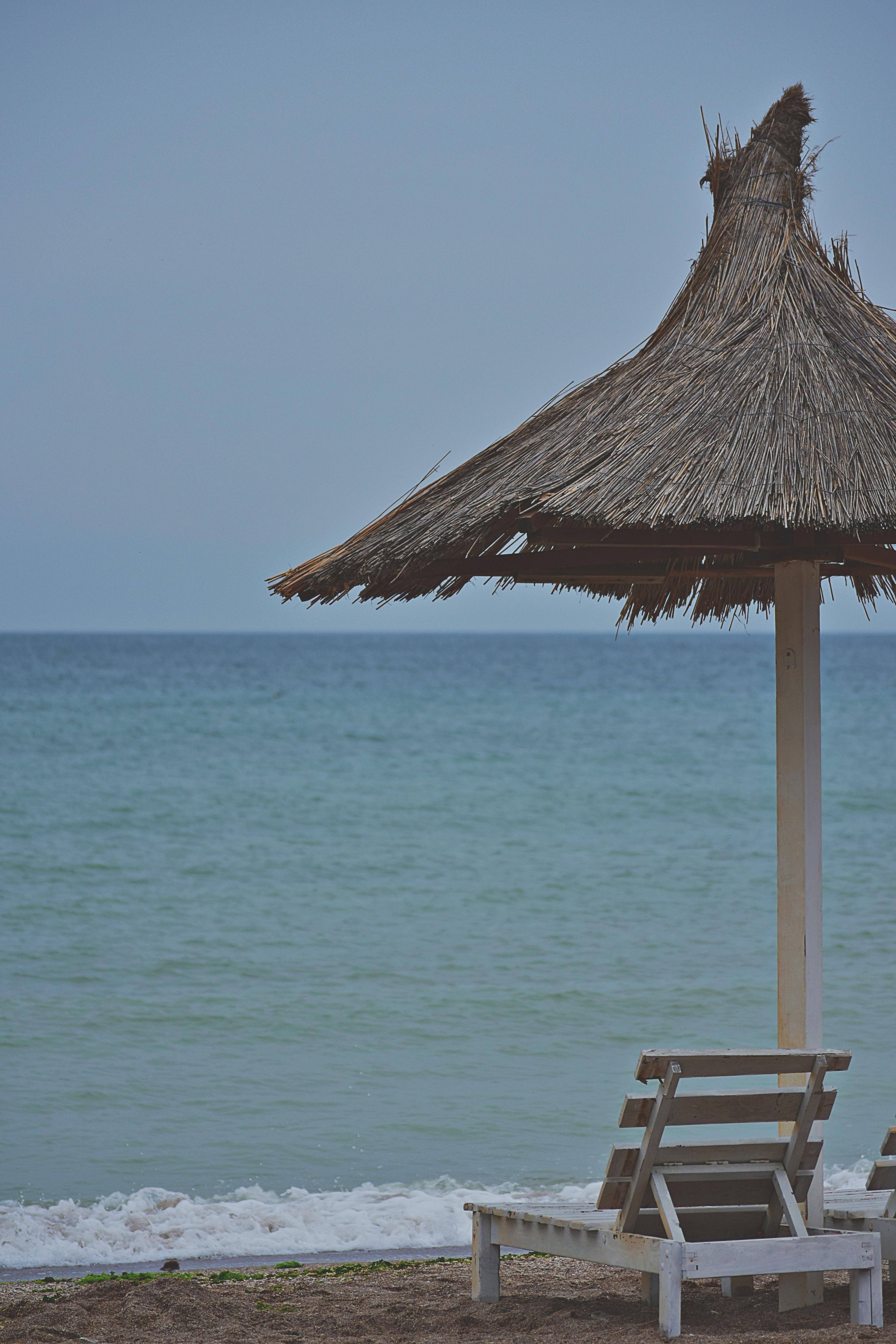 Chair With Hut On Beach Android Background